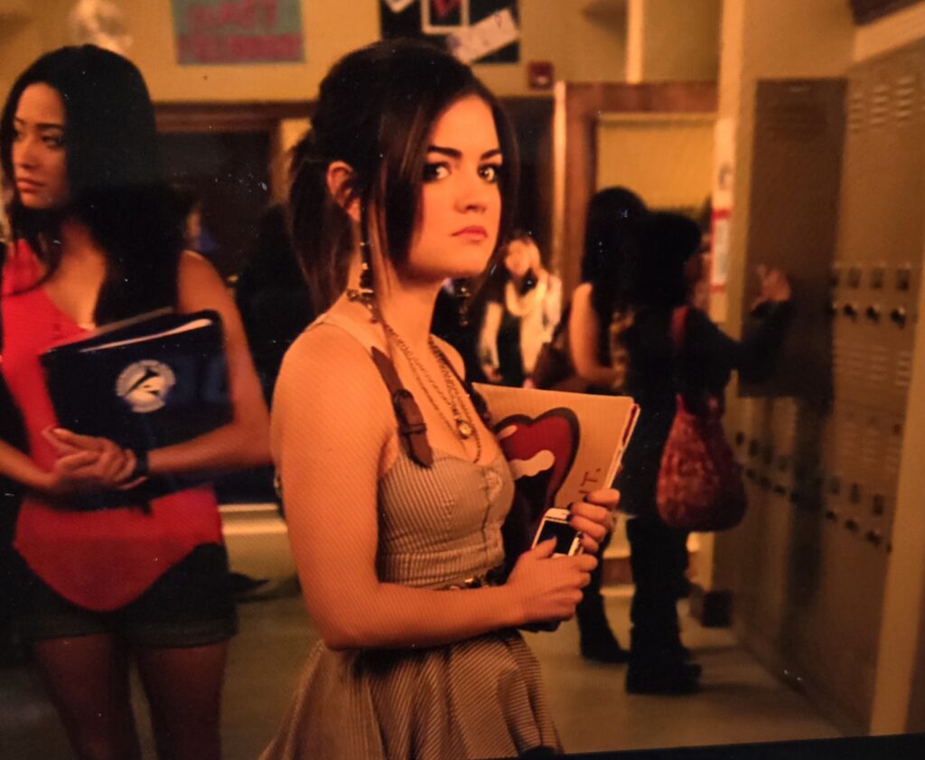 A zoomed in picture to show the detail of Aria’s buckle strap striped dress