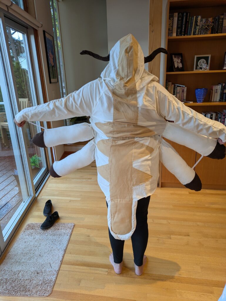 Back of Deepa's costume of Appa, which shows the long beige stripe down his back and his tail